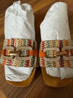 Desa heeled mules with decorative buckles